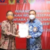 Logo KPK di Spanduk MoU Firli-Mahfud MD Salah?