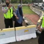 Oknum Wanita Bercadar Bawa Senpi Diduga Coba Terobos Istana Negara