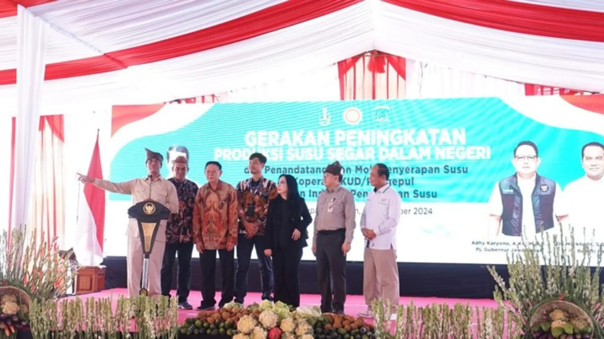 Mentan Amran Sulaiman saat acara Gerakan Peningkatan Produksi Susu Segar Dalam Negeri dan Penandatanganan MoU