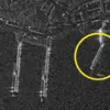 Citra satelit pangkalan Rybachiy di Kamchatka menunjukkan dermaga telah melengkung dari posisi aslinya. (Umbra