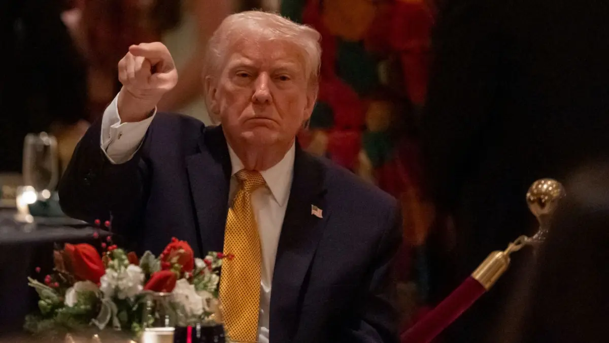 Presiden AS Donald Trump menghadiri makan malam Natal di ballroom klub Mar-a-Lago di Palm Beach, Florida, Amer
